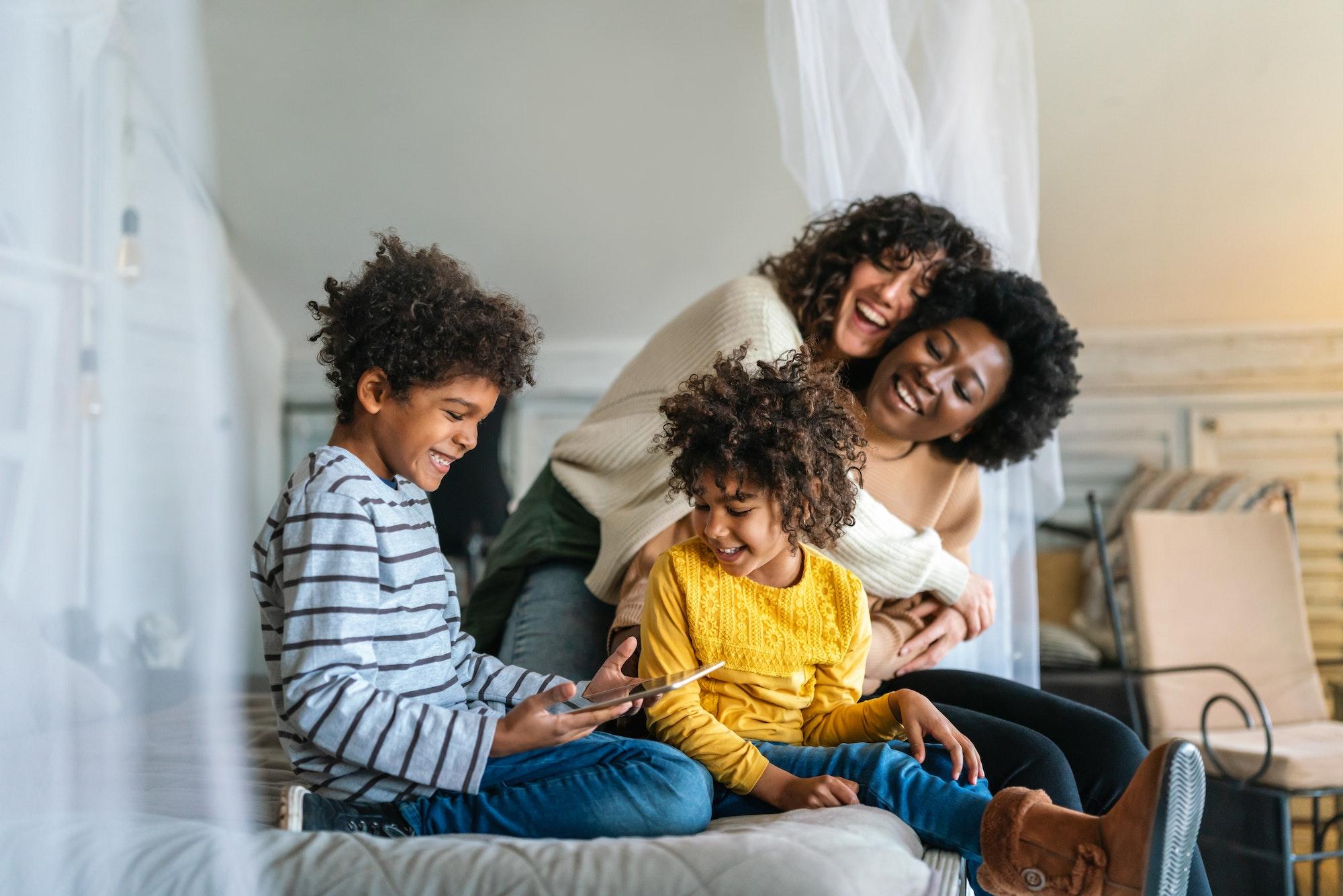 happy queer family with 2 children