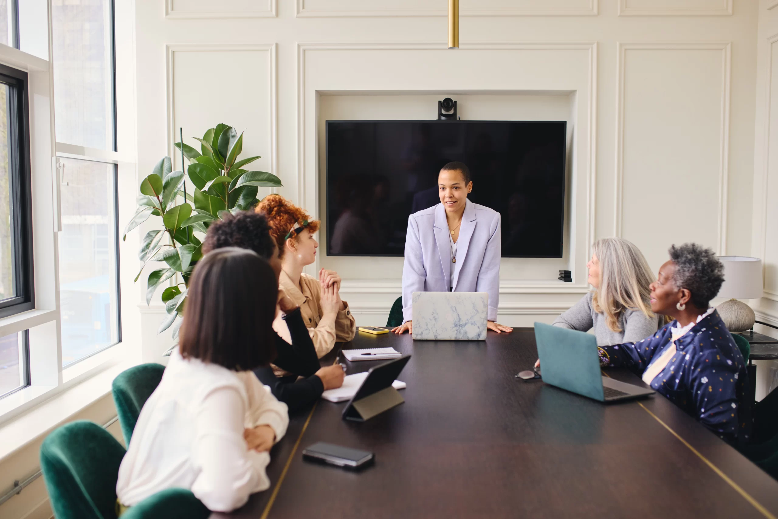 diverse business team meeting at a conference table