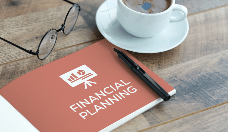 An open booklet that says "Financial Planning"