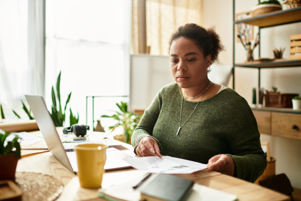 woman at her computer starting to financial plan after divorce
