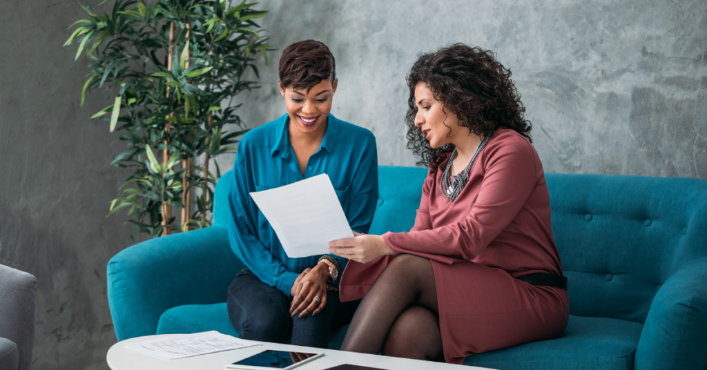 high net worth women reading about how to switch financial advisors