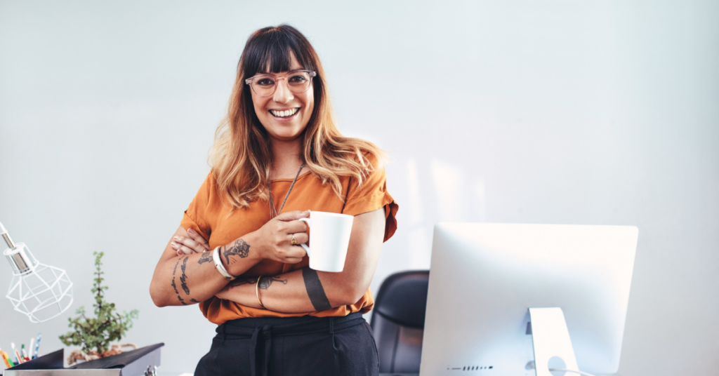 female business owner pleased with her retirement account selection